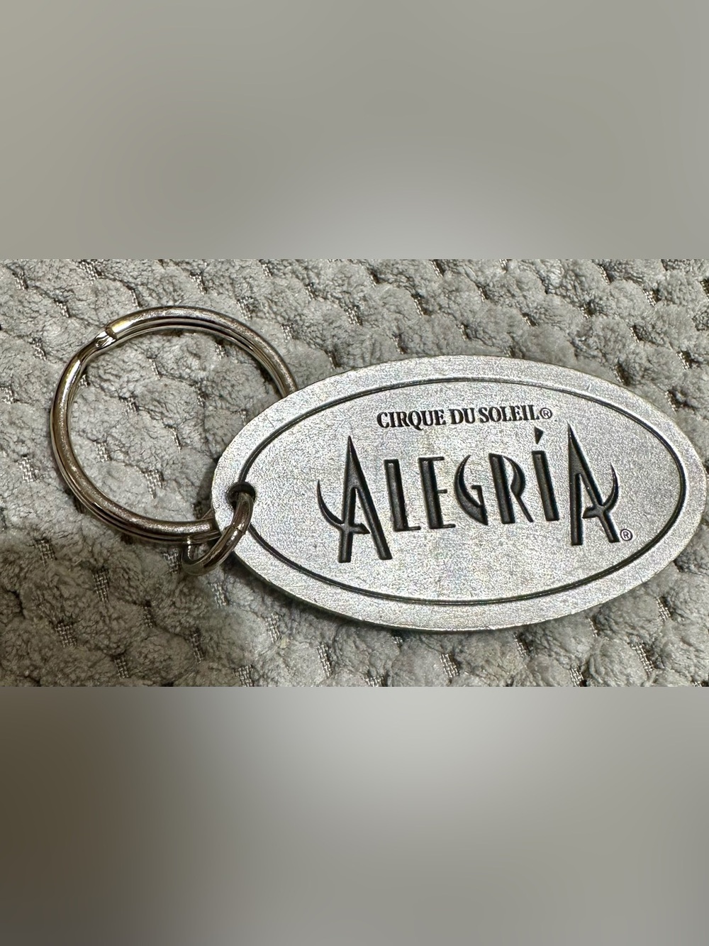 Cirque du Soleil Alegría Silver Logo Keychain